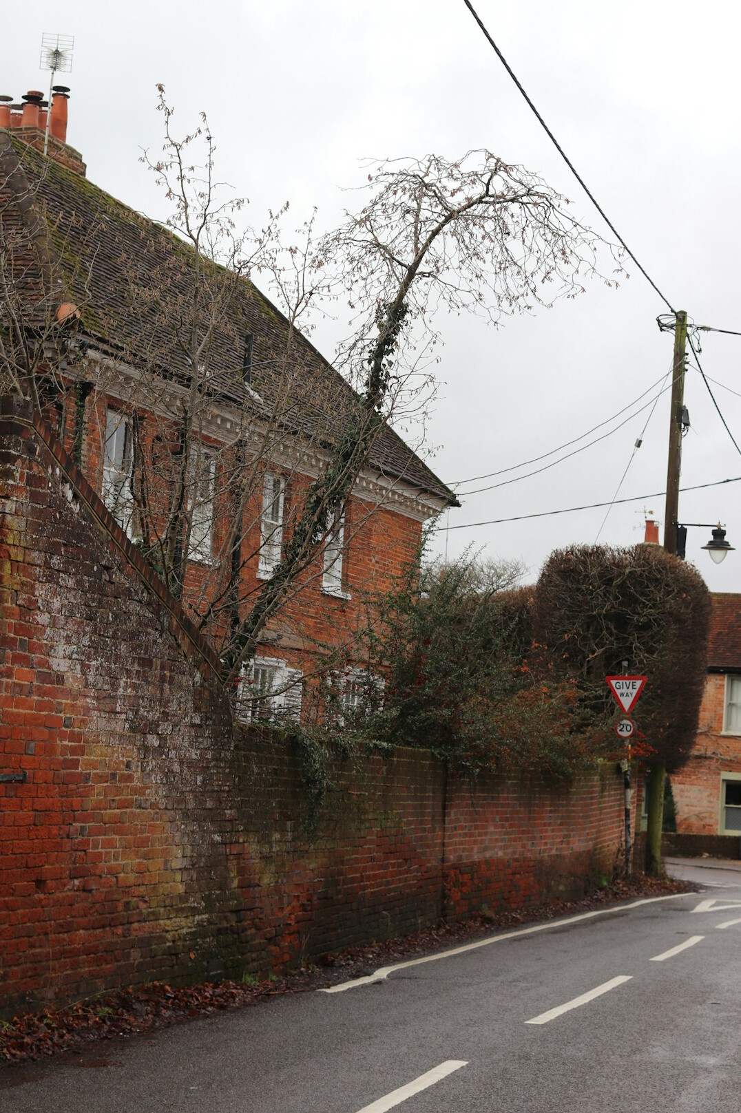 Brick house exterior with a tiled roof