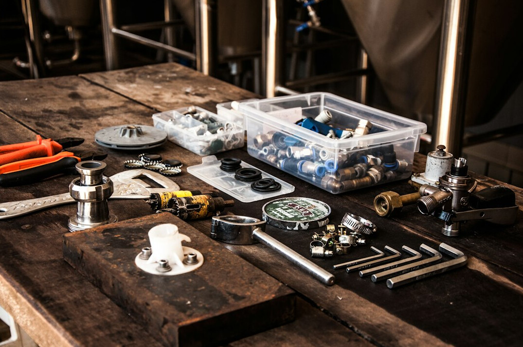 Architectural plans and tools on a work table